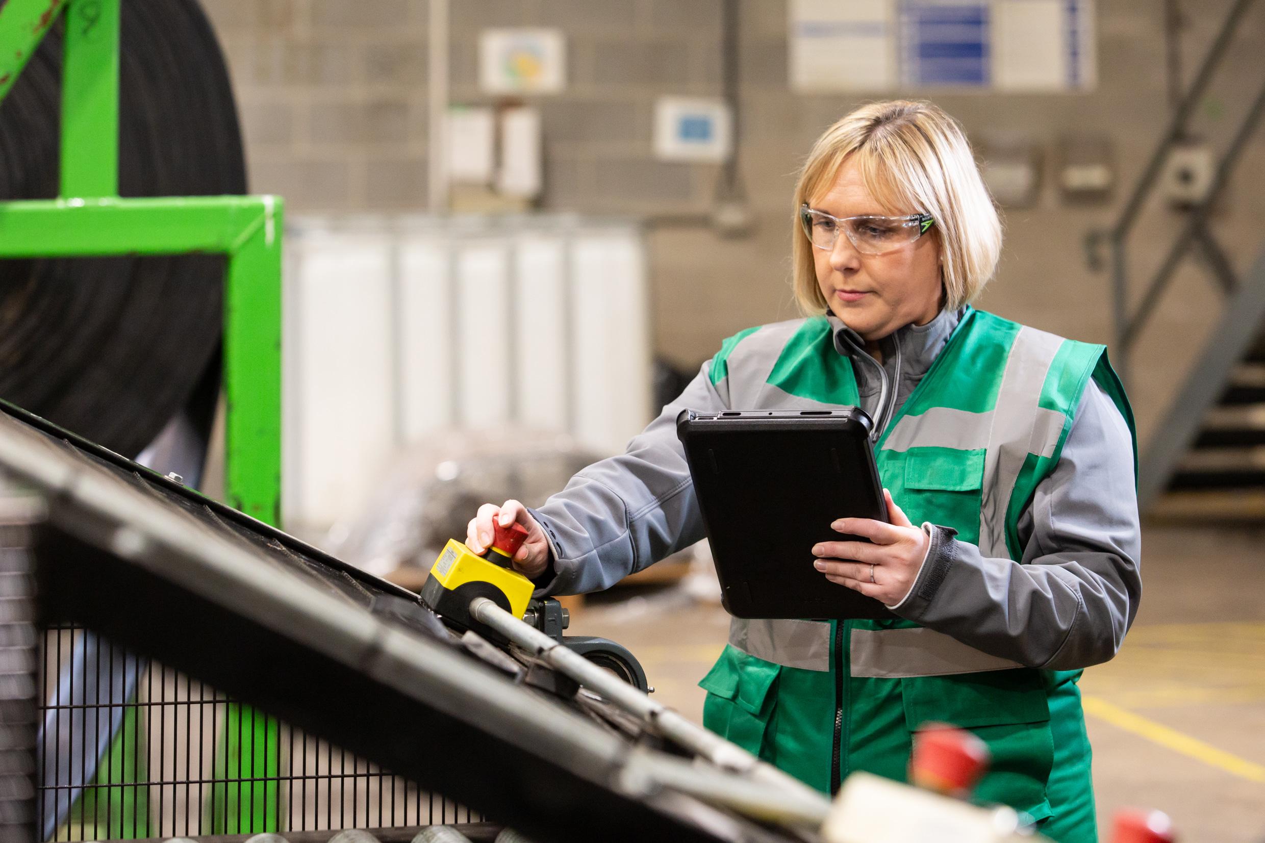 Employee performing safety checks